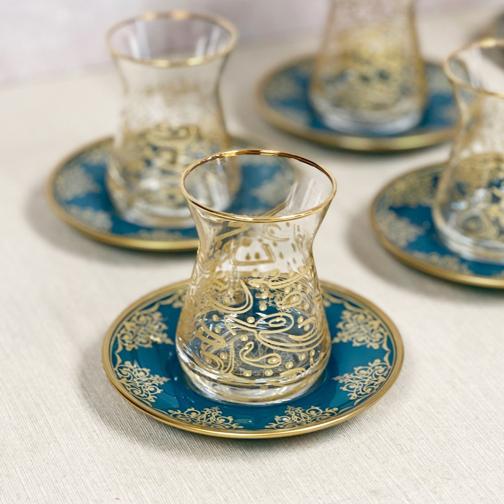 http://www.teaandlinen.com/cdn/shop/products/arabic-calligraphy-tea-cup-set-465935.jpg?v=1675629352